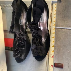 Steve Madden black high heels with a ruffle